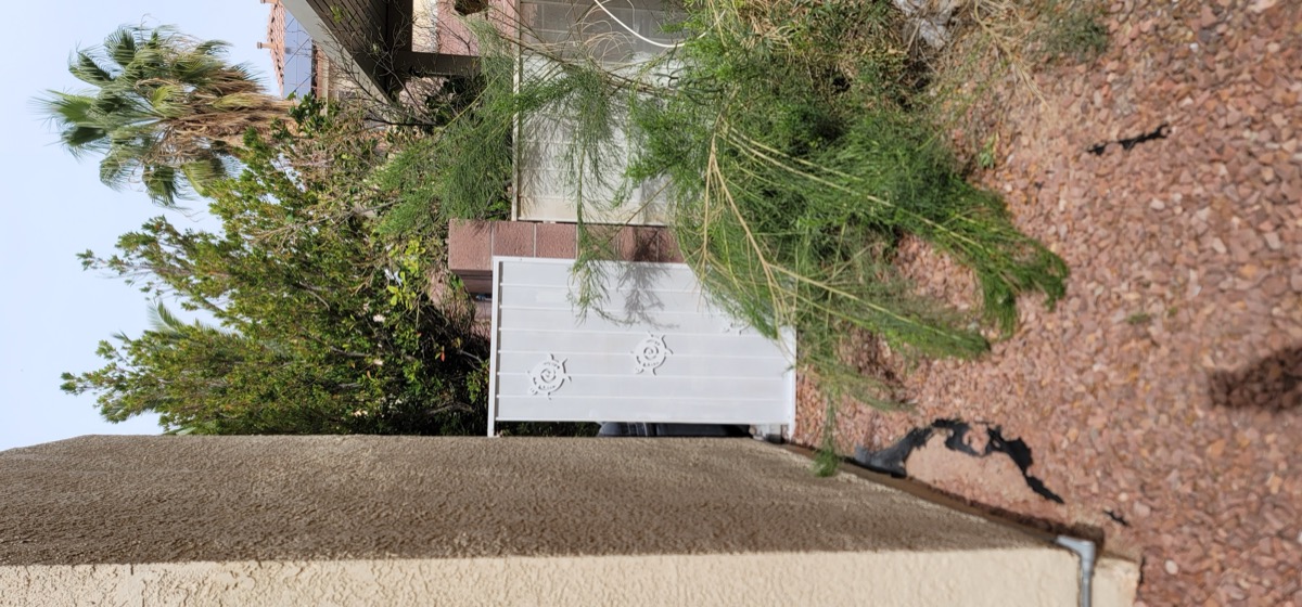 Before shot — gate repair and exterior work in Las Vegas